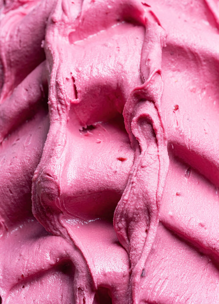 Frozen Pomegranate flavour gelato - full frame detail. Close up of a pink surface texture of Ice cream. - Foto, imagen