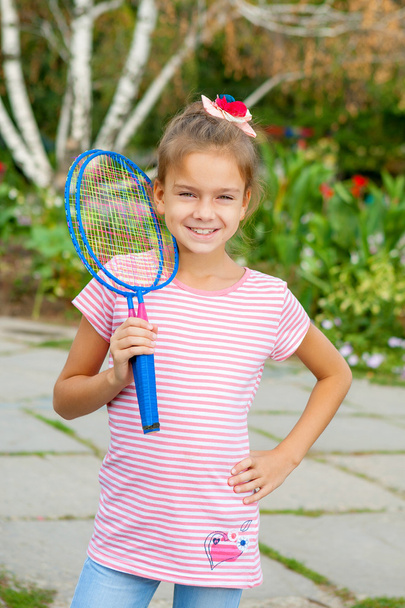 Cute girl with racket Outdoors - Fotoğraf, Görsel