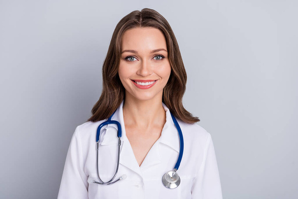 Portrait of qualified virologist lady smiling hear patient internet symptoms diagnostics isolated grey color background - Fotó, kép