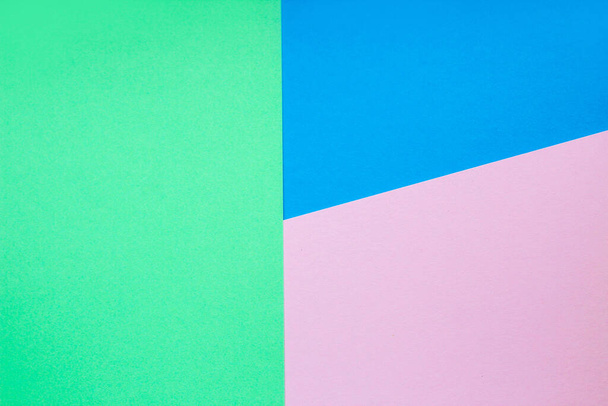 Abstract background with colored paper blue with pink and green color. - Foto, Imagen