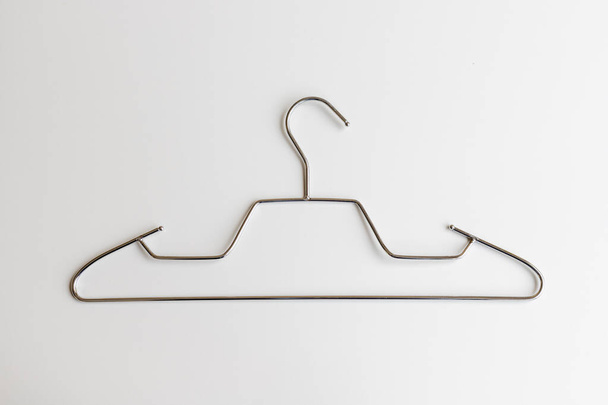 Stainless steel cloth hanger on white background - Fotoğraf, Görsel