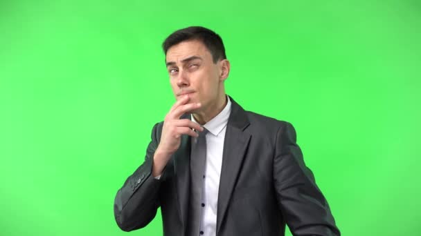 Evil man in elegant suit rubbing hands - Footage, Video