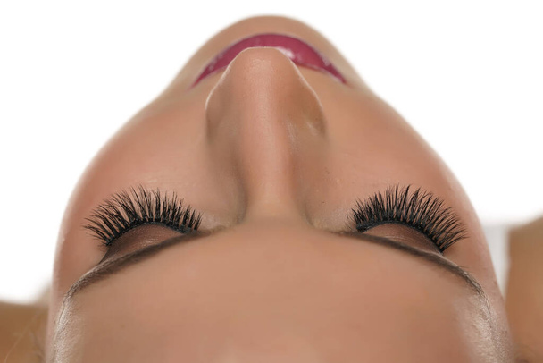 Woman with beautiful eyelashes after extension procedure, closeup - Photo, Image