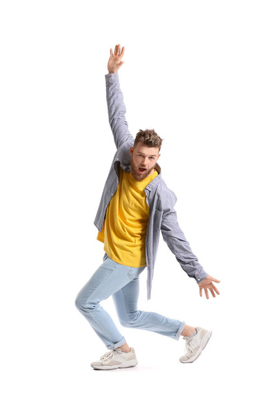 Cool dancing young man isolated on white - Zdjęcie, obraz