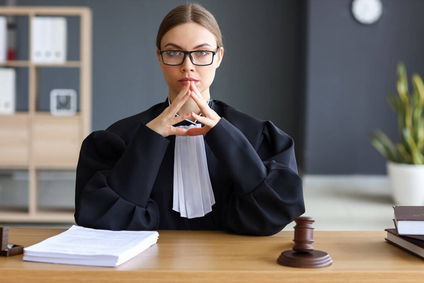 Female judge at workplace in courtroom - Valokuva, kuva