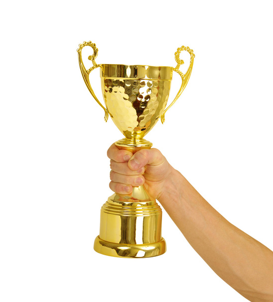 hand en gouden trofee  - Foto, afbeelding
