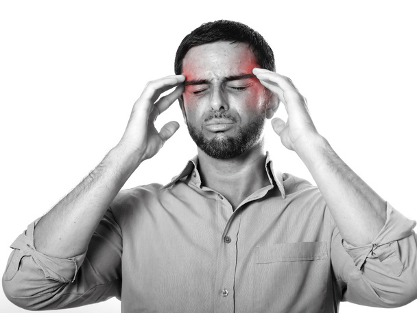 Young Man with Beard suffering Headache and migraine in pain expression - Foto, immagini
