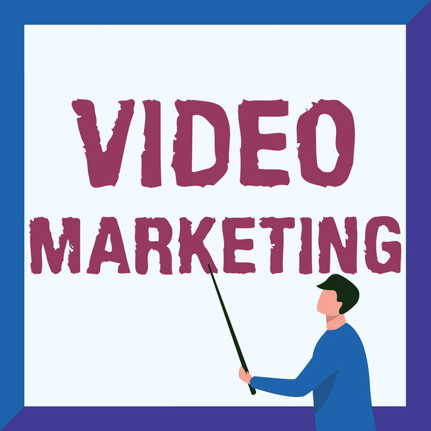 Hand writing sign Video Marketing. Word Written on Video Marketing Instructor Drawing Holding Stick Pointing Board Showing New Lessons. - Photo, Image