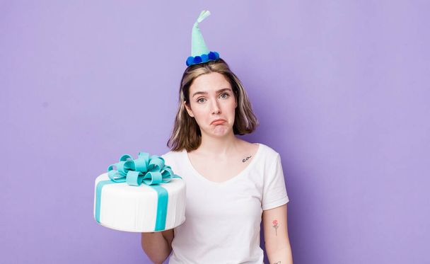 pretty caucasian woman feeling sad and whiney with an unhappy look and crying. birthday concept - 写真・画像