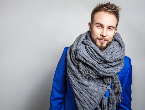Elegant & Positive young handsome man in scarf. Studio fashion portrait. - Φωτογραφία, εικόνα