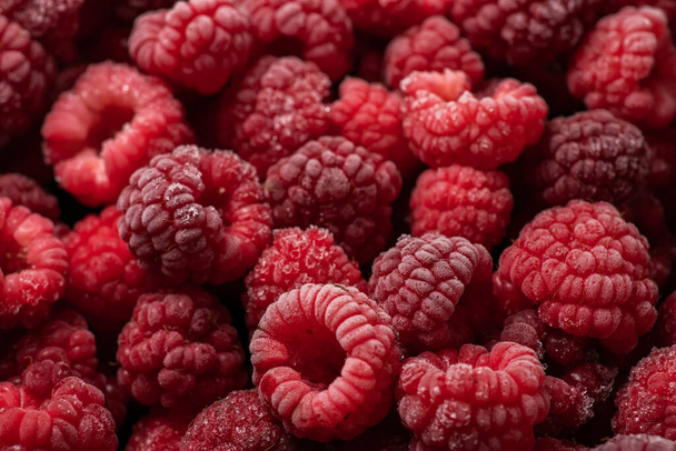 Frozen berries of raspberries, covered with hoarfrost. Close-up. - Photo, Image