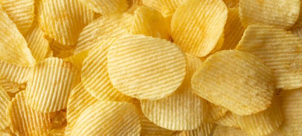 croccante patatine dorate snack texture sfondo - Foto, immagini