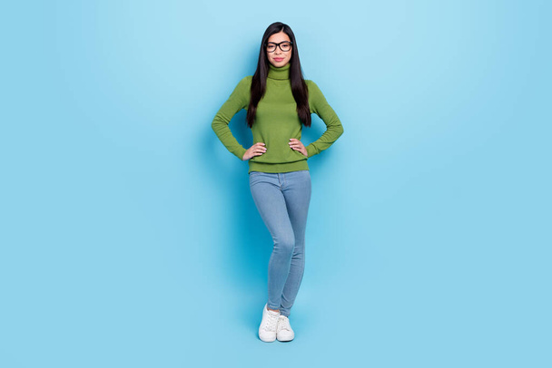 Full length body size view of attractive smart clever girl nerd hands on hips isolated over bright blue color background - Fotoğraf, Görsel