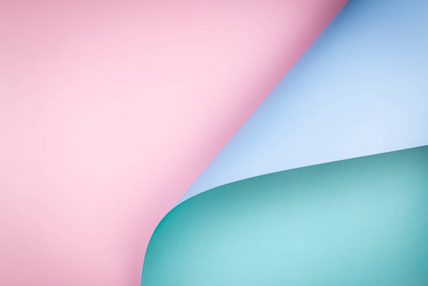 Abstract geometry composition background in pastel blue, pink, green colors with geometric shapes and curved wave lines. Top view, copy space - Photo, Image