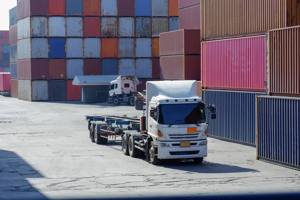 Image of a truck in a container yard - Photo, Image