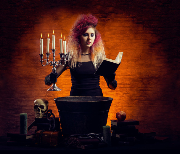 Young and beautiful witch making witchcraft - Foto, Bild