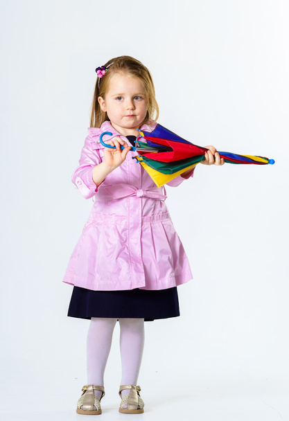 Cute little girl with colorful umbrella - Zdjęcie, obraz