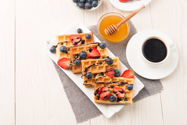 Belgian waffles for breakfast. Dessert food concept.  - Photo, Image