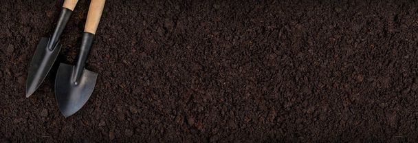 Tools soil for planting on soil background horizontal with copy space - Photo, Image