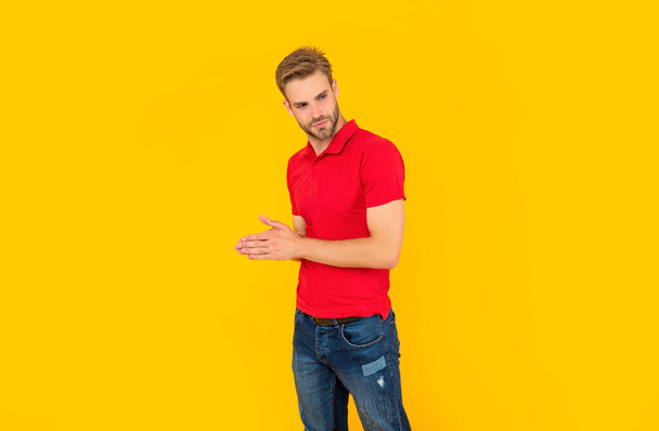 guy with bristle on yellow background, mens beauty - 写真・画像