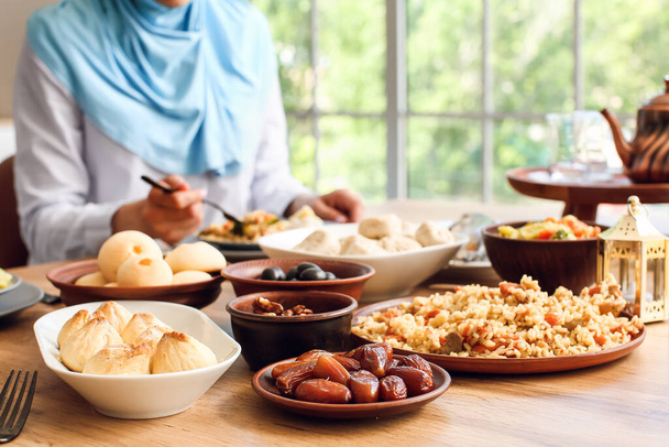 Traditional Eastern dishes on table. Celebration of Eid al-Fitr - Foto, imagen