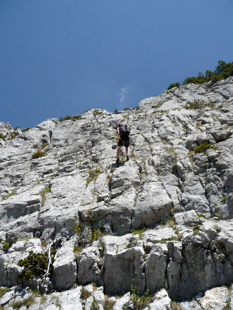 Climber at Ruchenkopfe mountains in Bavaria, Germany - Φωτογραφία, εικόνα