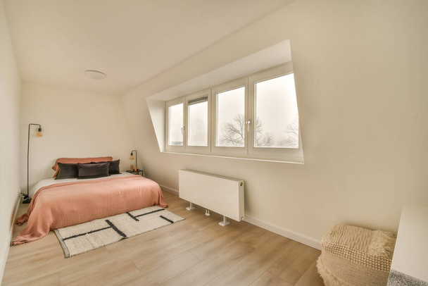 Spacious white bedroom in a minimalist style - Fotoğraf, Görsel