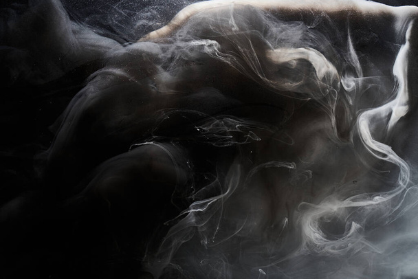 Black and white ink background, colorful fog, abstract swirling ocean, acrylic paint pigment underwater, dark smoke - Fotoğraf, Görsel