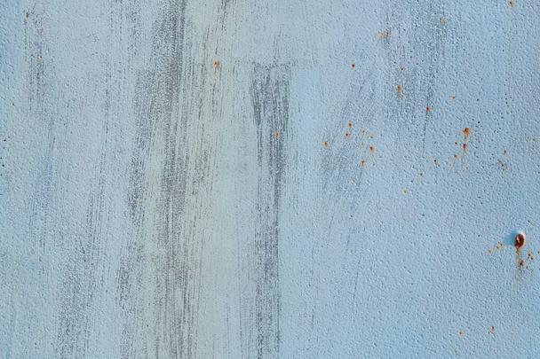 texture of an old wall with cracks and scratches which can be used as a background - Photo, Image