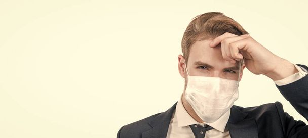 boss man in medical mask during coronavirus quarantine. avoid pandemic spread. - Фото, зображення