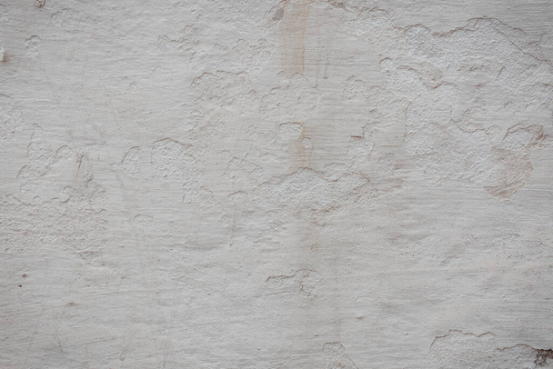 tekstura starej ściany betonowej z pęknięciami i zadrapaniami, które mogą być wykorzystane jako tło - Zdjęcie, obraz