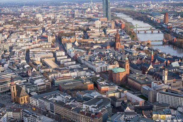 february 20, 2020 frankfurt germany .city view with houses river and bridge from a height - 写真・画像