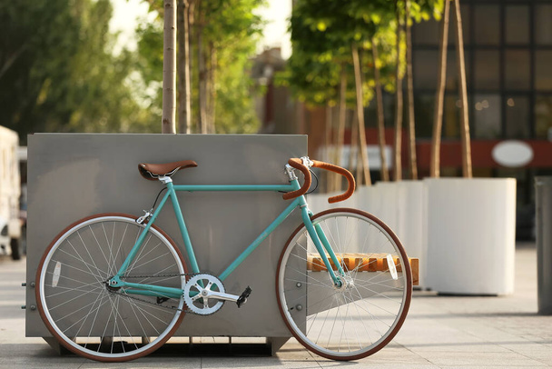 Stylish bicycle on city square - 写真・画像