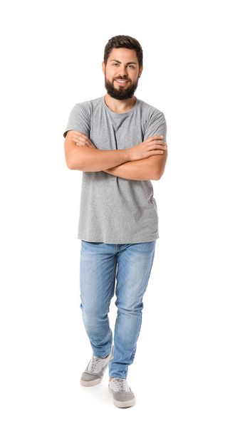 Handsome man in grey t-shirt on white background - Foto, immagini