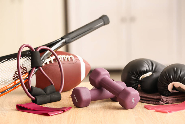 Stylish sport equipment on floor in room - Photo, Image
