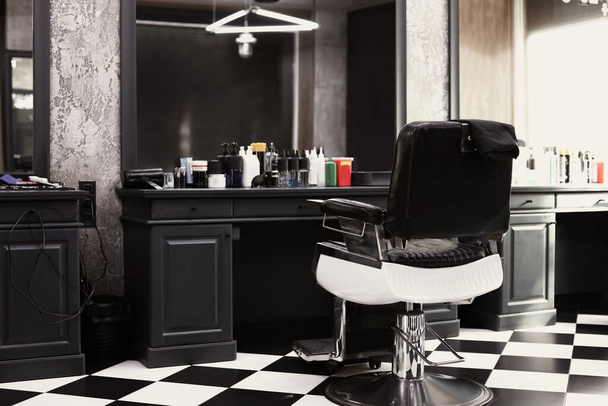 Hairdresser's workplace in modern barbershop. Monochrome interior - Fotoğraf, Görsel