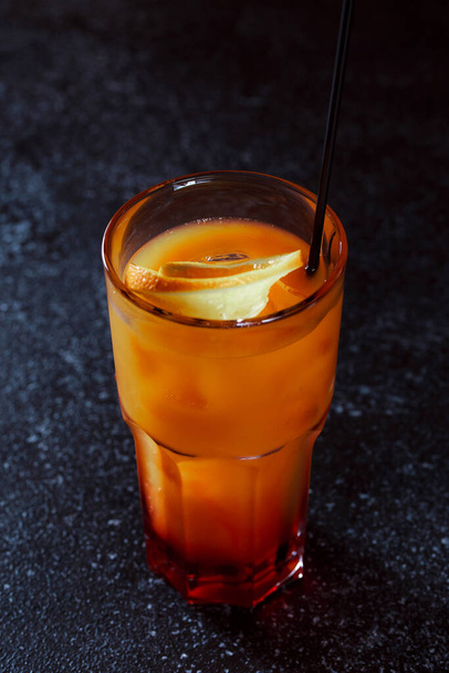 Tequila Sunrise drink. Refreshing alcoholic cocktail with orange and grenadine. - Foto, Imagem