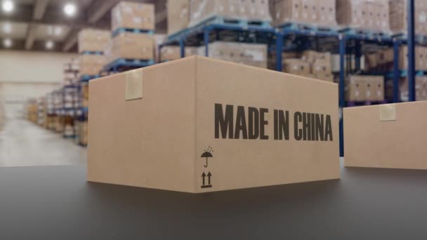 Boîtes avec texte MADE IN CHINA sur convoyeur. Produits chinois liés à l'animation 3D en boucle - Séquence, vidéo