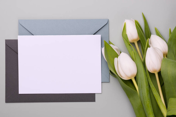 Greeting card mockup with white tulips, postcard or invitation. - Fotografie, Obrázek