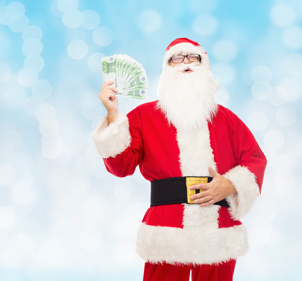 man in costume of santa claus with euro money - Φωτογραφία, εικόνα