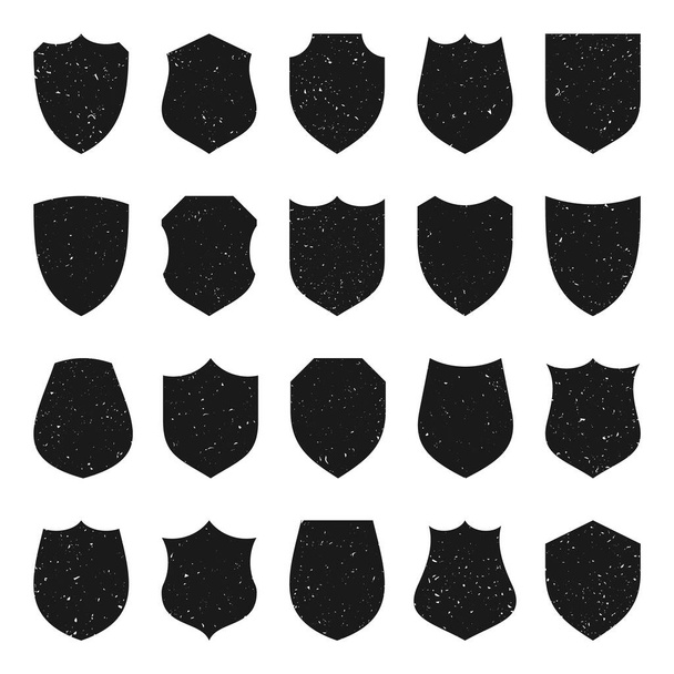 Set of various vintage shield icons. Black heraldic shields with grunge texture. Protection and security symbol, label. Vector illustration. - Vector, Image