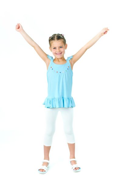 Photo of cute little girl in colored clothes on white background - Valokuva, kuva