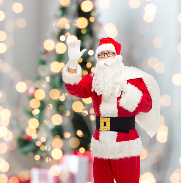 man in costume of santa claus with bag - Photo, Image