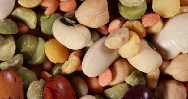 Macro closeup rotating turning Mixed beans multi grain colourful mixture  - Footage, Video