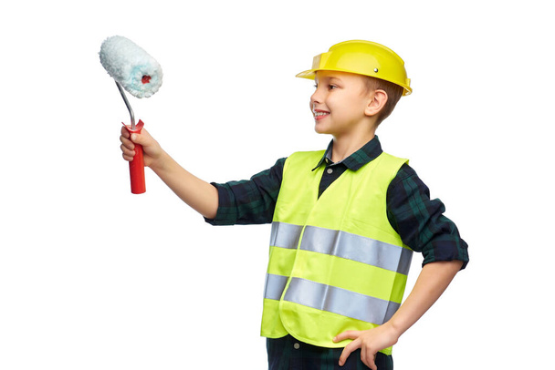 little boy in protective helmet with paint roller - Photo, image