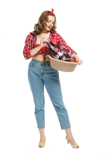 Portrait of young emotional girl, housewife wearing homewear in 70s, 80s fashion style isolated on white studio background. Emotions, female rights, beauty, family - Zdjęcie, obraz