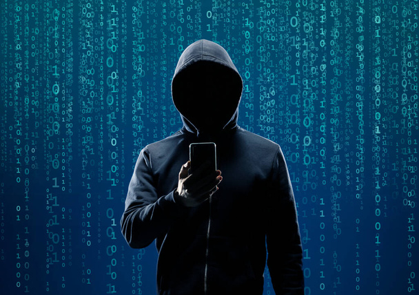 Wanted Hacker is Coding Virus Ransomware Using Abstract Binary Code. Cyberattack, System Breaking and Malware Concept. - Photo, Image