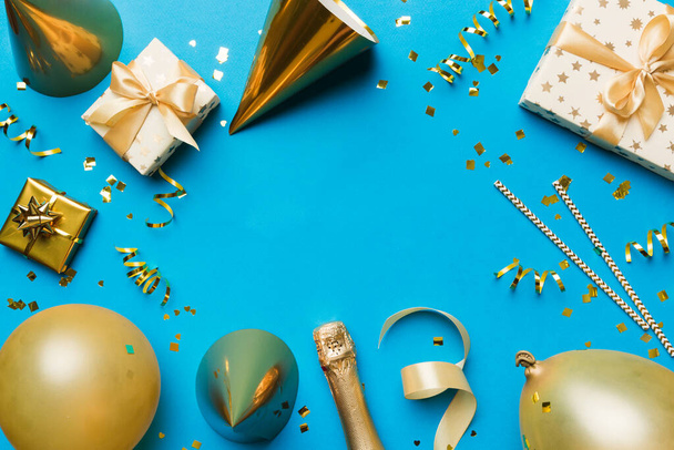 Flat lay party decoration concept on pastel colored background from above. Love concept. Holiday celebration. Valentine Day or birthday party decoration. - 写真・画像