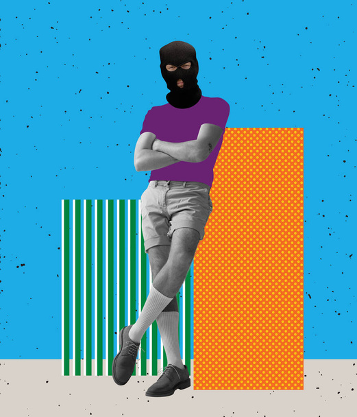 Contemporary art collage. Brutal man with drawn cloth element wearing black balaclava, posing isolated over blue background - Φωτογραφία, εικόνα