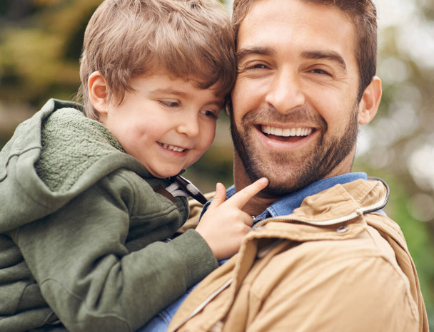He can always make me laugh. Shot of a father and son enjoying a day outdoors. - Foto, Imagen